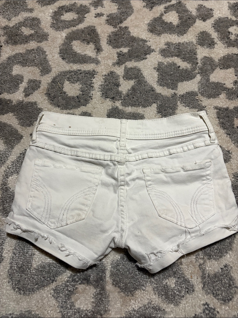 Vintage Hollister White Ripped Low-Rise Denim Shorts